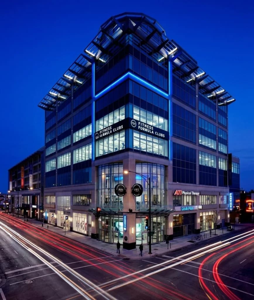 North Avenue Collections building at dusk at North Avenue and Sheffield. Dental Salon Lincoln Park is on the 8th floor.
